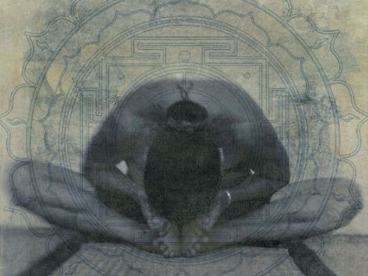 An image depicting a person practicing a variation of Baddha Konasana or bound angle pose