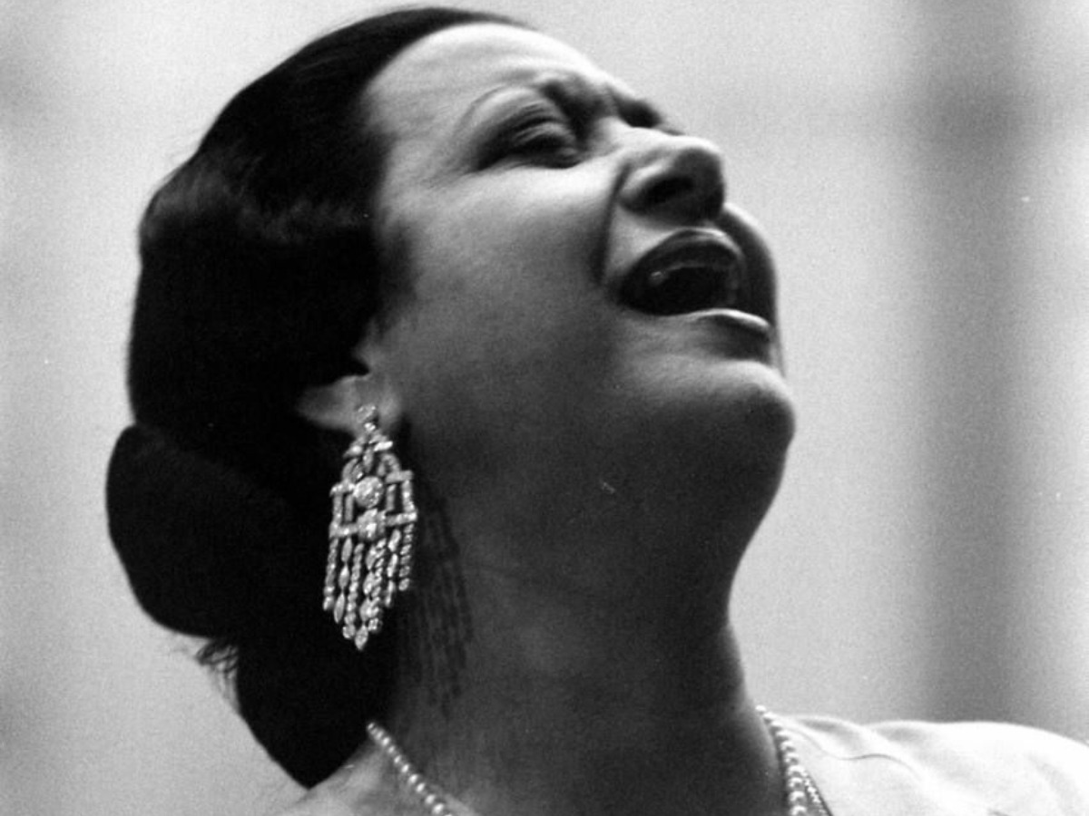 Iconic Egyptian tarab singer (mutribah) Umm Kulthum photographed while singing emotionally