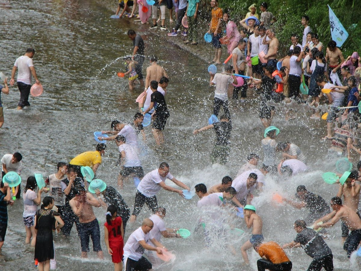 Crowds of people engage in city-wide water fights during Cambodia’s Chaul Chnam Thmey, also known as Songkran in Thailand