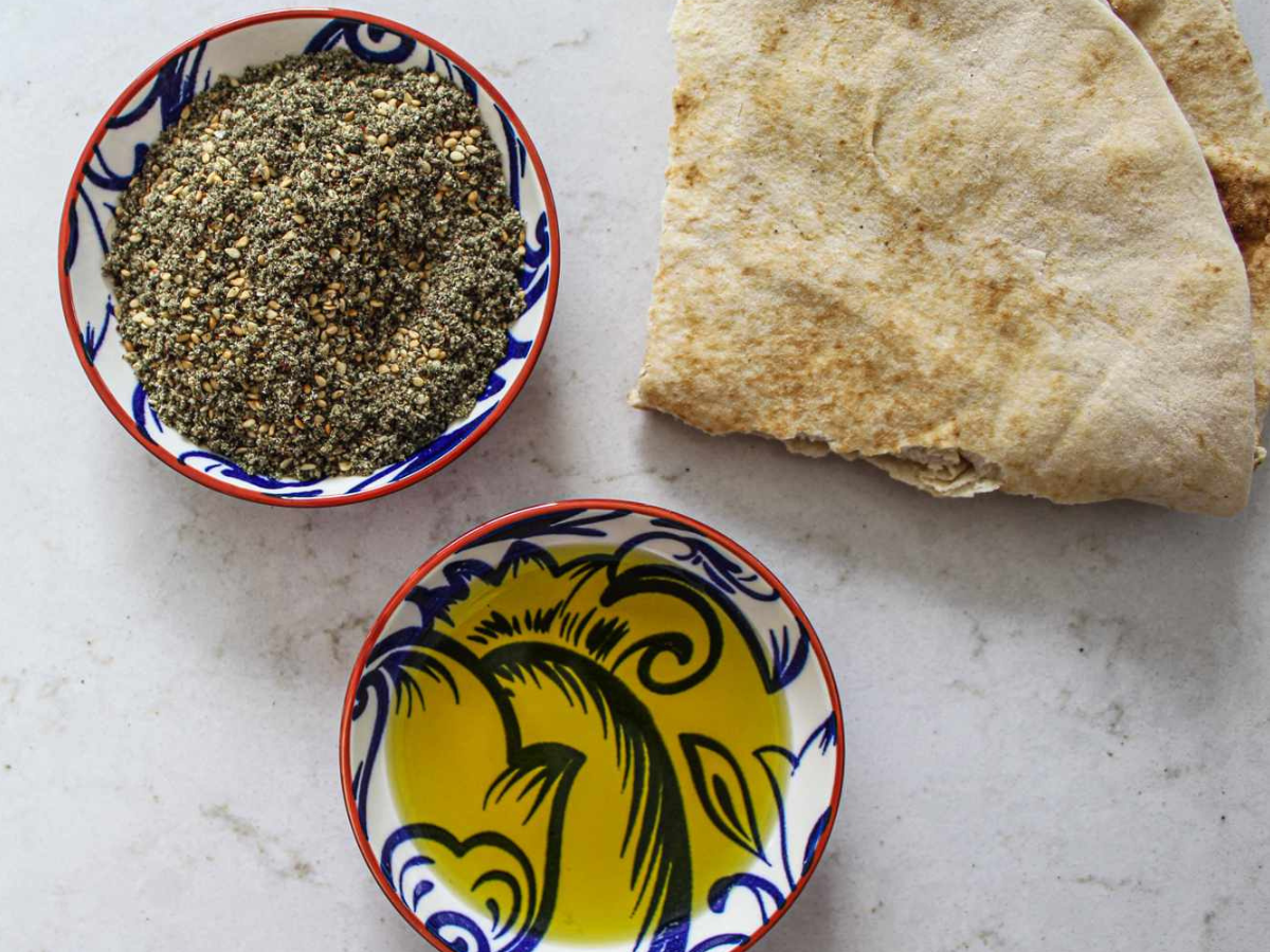 Palestinian zaatar / za’atar and olive oil / zeit zeytoun with Arabic bread, a simple Levantine breakfast staple