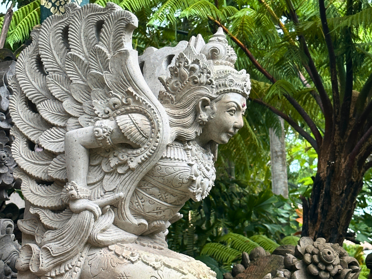 Winged apsara sculptures and statues in Bali, Indonesia