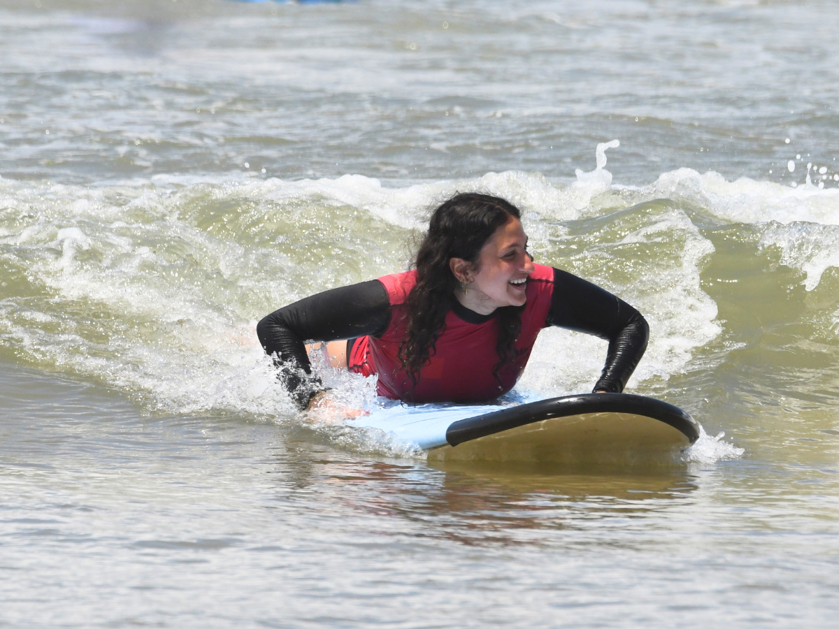 Smiling gleefully during my first surfing lesson in Weligama Bay, Sri Lanka