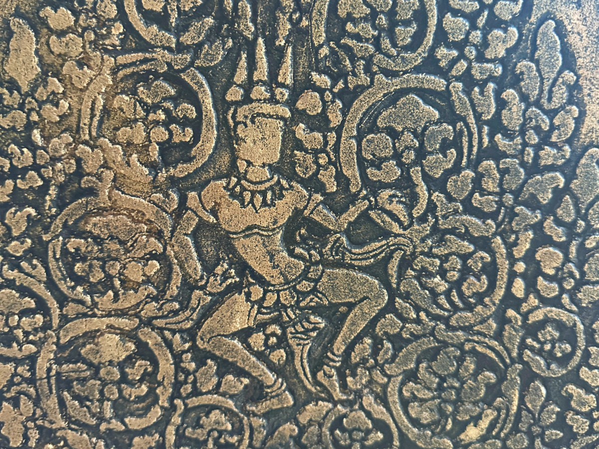 Ancient carvings of an apsara dancing on the walls of Angkor Wat, Siem Reap, Cambodia